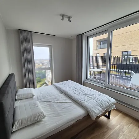Stijlvol Nieuwbouwappartement Op Wandelafstand Zee - Inclusief Parkeerplaats דירה